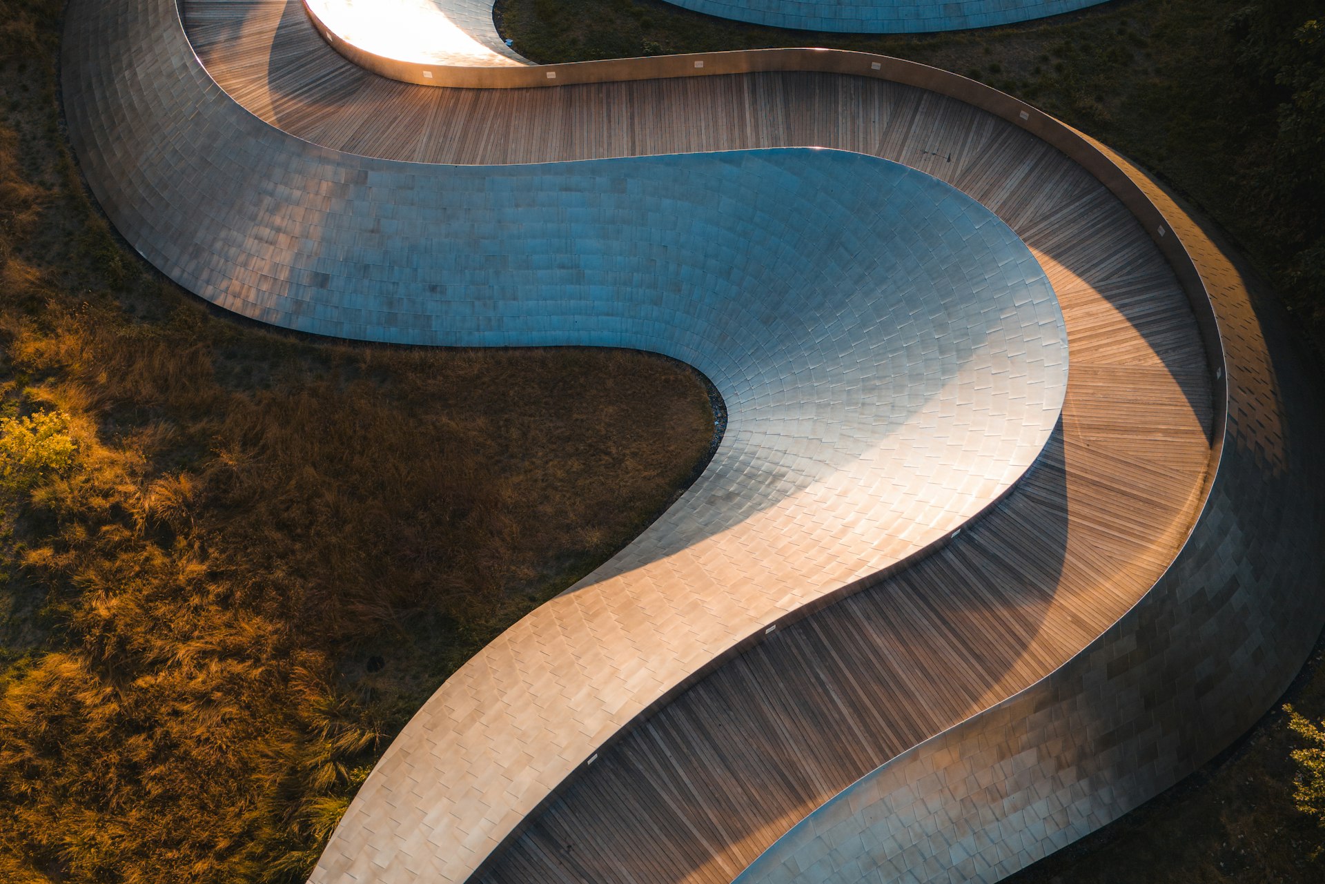 IT technician working with network cables and equipment in a server room